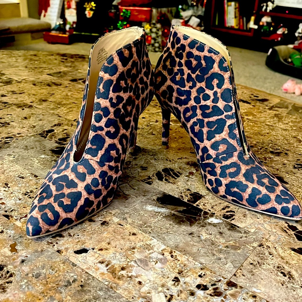 Jessica Simpson leopard boots worn once